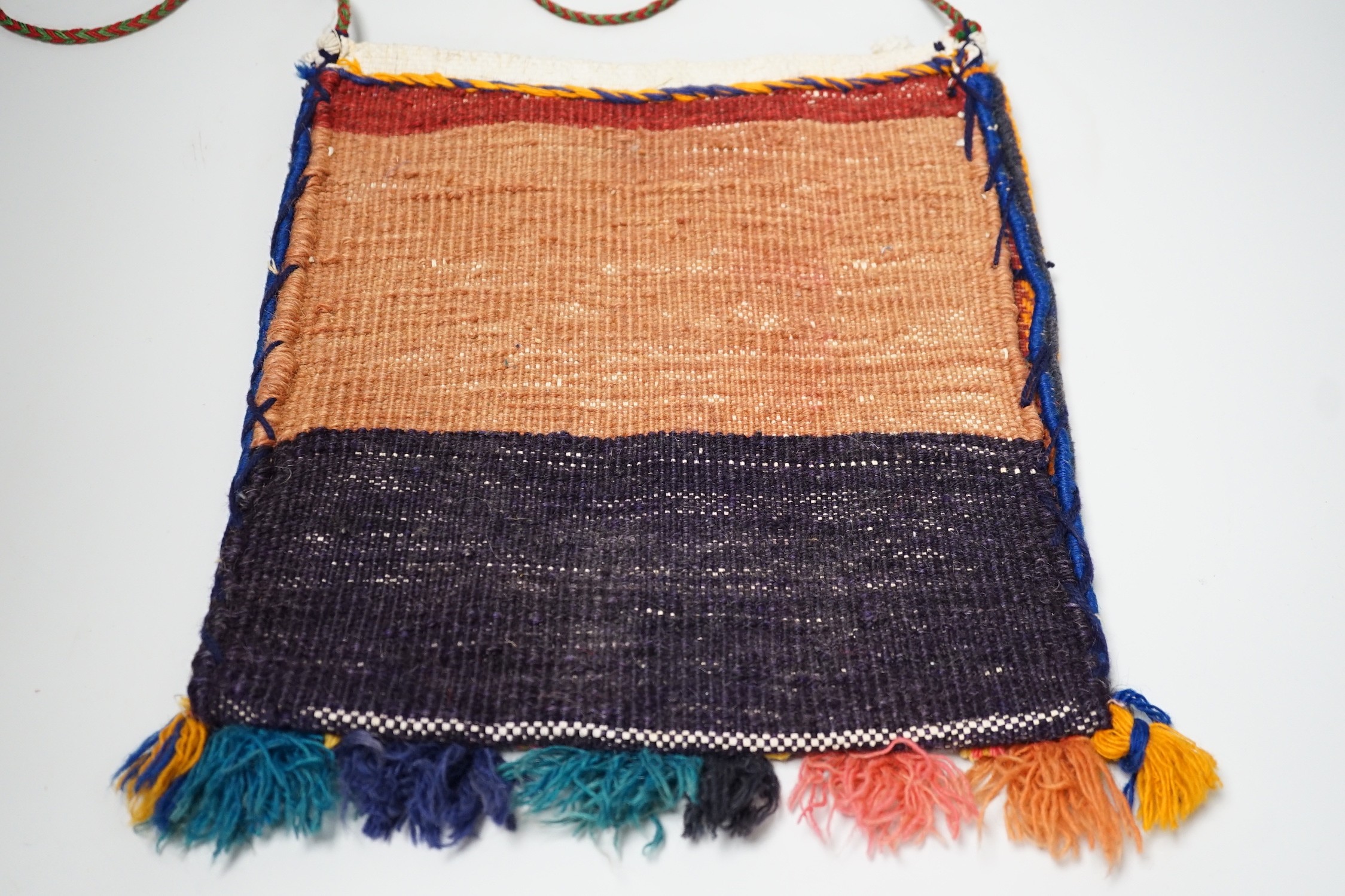 A Qashgai bag with tassel decoration, 31 x 29cm